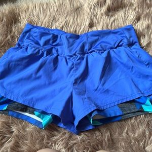 Blue workout shorts with spandex attached